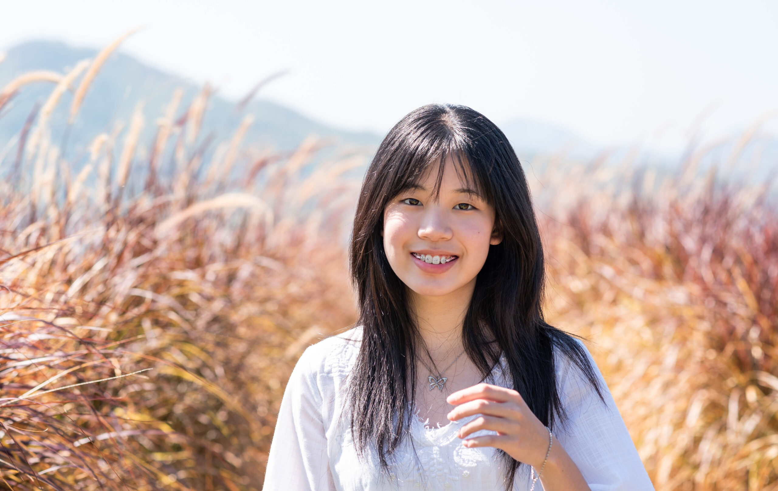Teenager with braces smiling