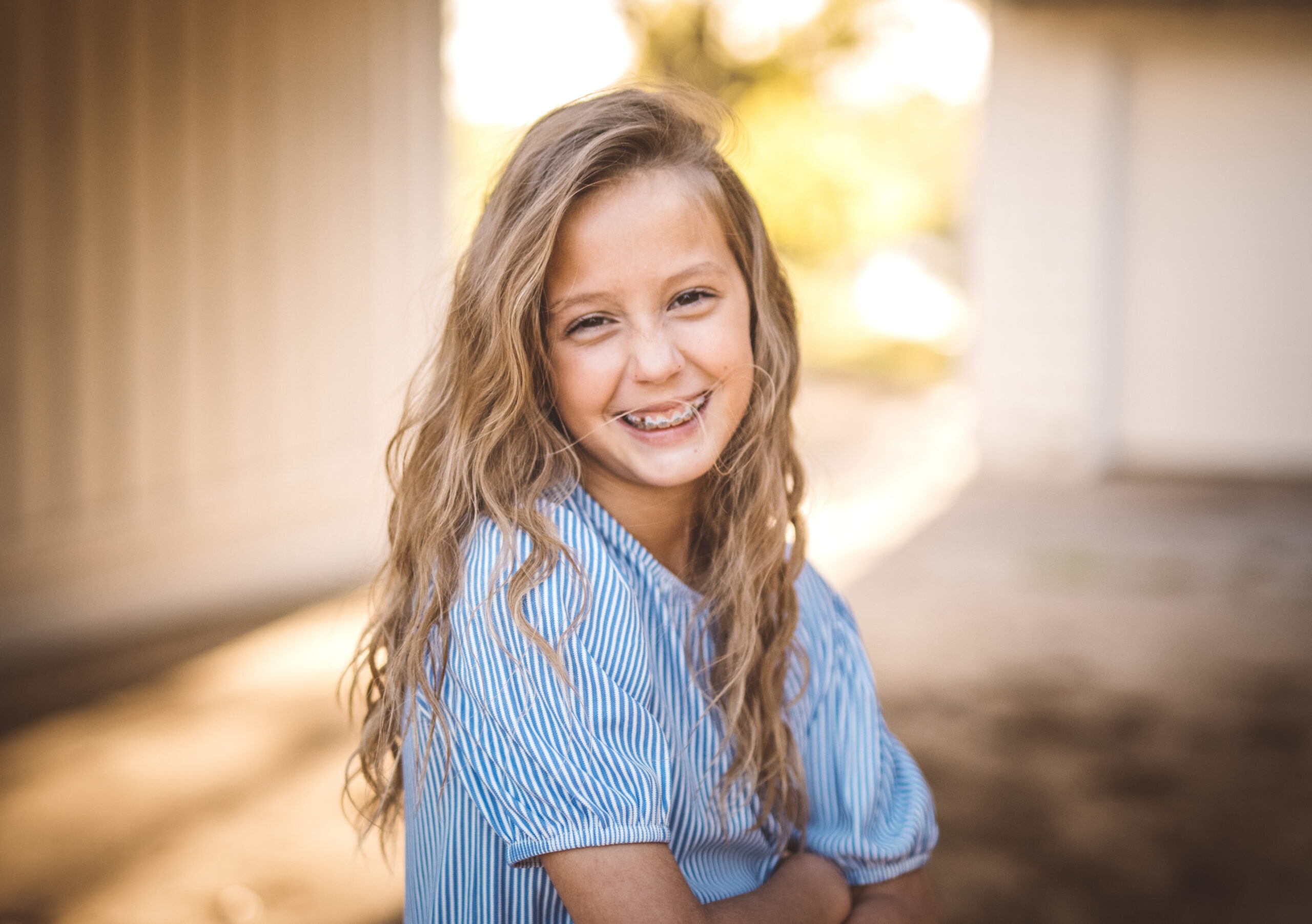 Child with braces smiling