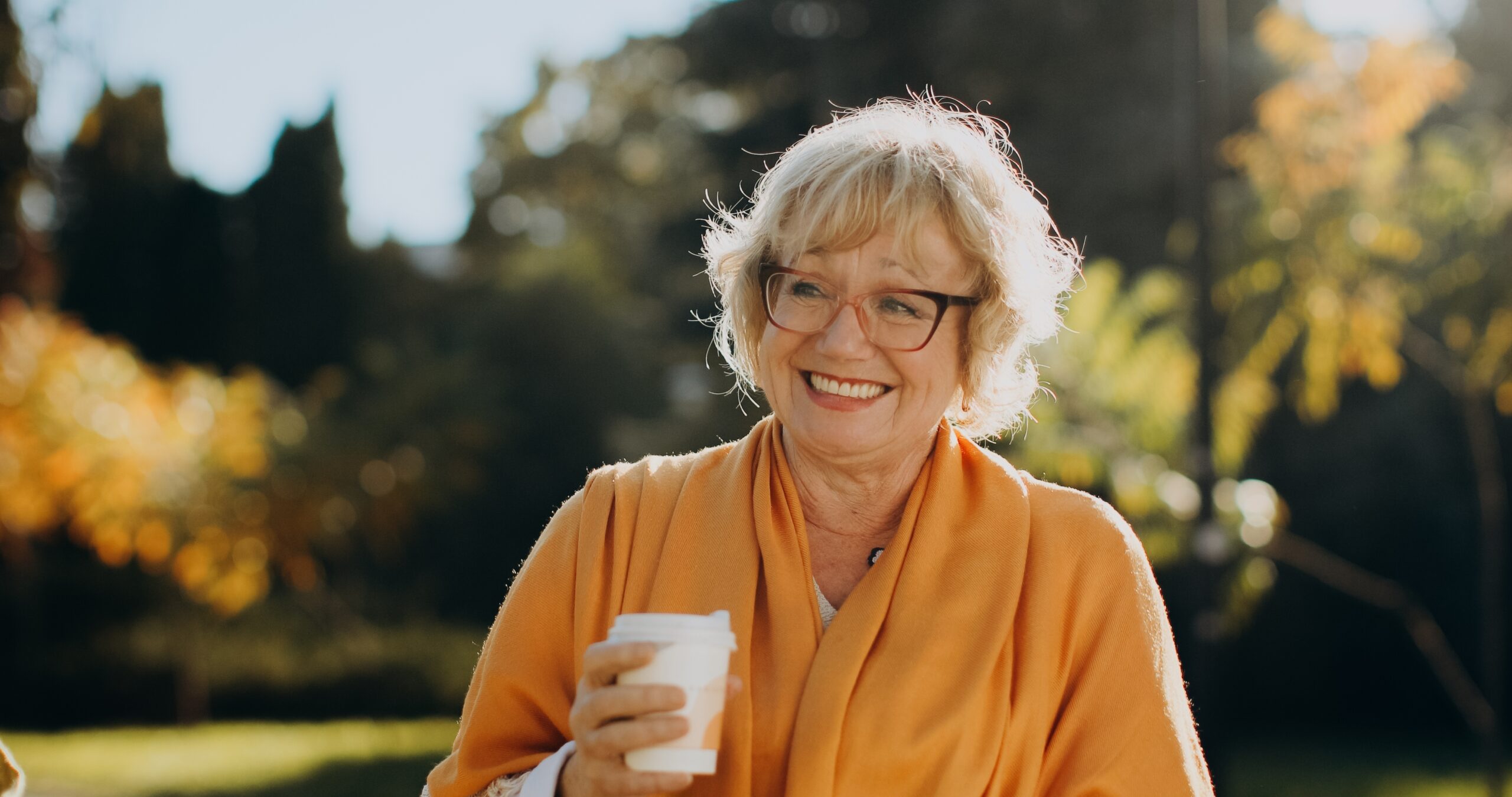Smiling woman enjoying a bright morning