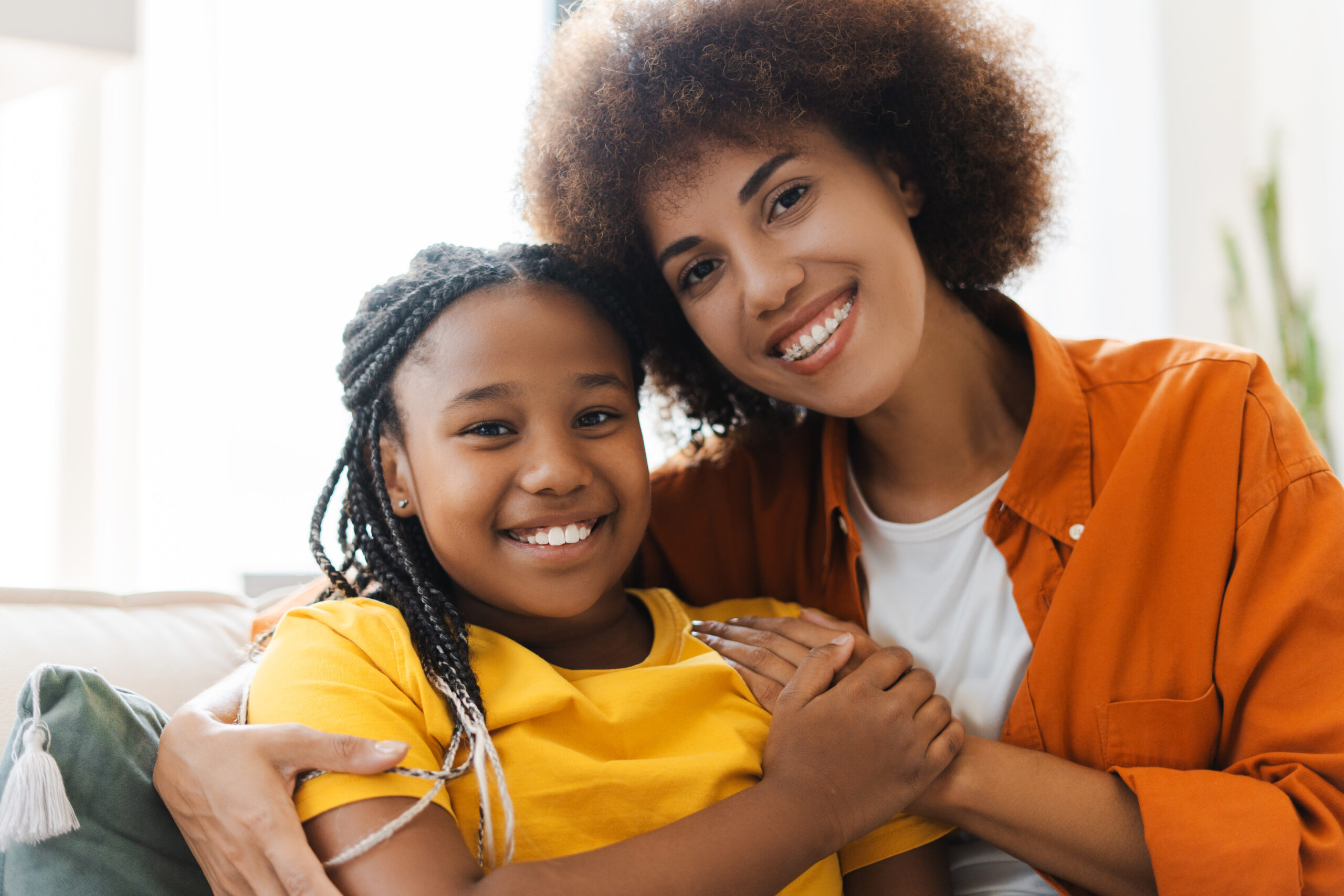 Woman smiling with her daughter